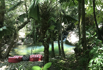Daintree Holiday Home Swimming Hole View Scenic view looking down toward the private swimming hole and lounge bean bags at our Daintree holiday home.