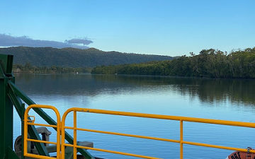 Getting Here & Location Map details Scenic panoramic view looking down the Daintree River from the vehicle transit ferry crossing towards Cape Tribulation